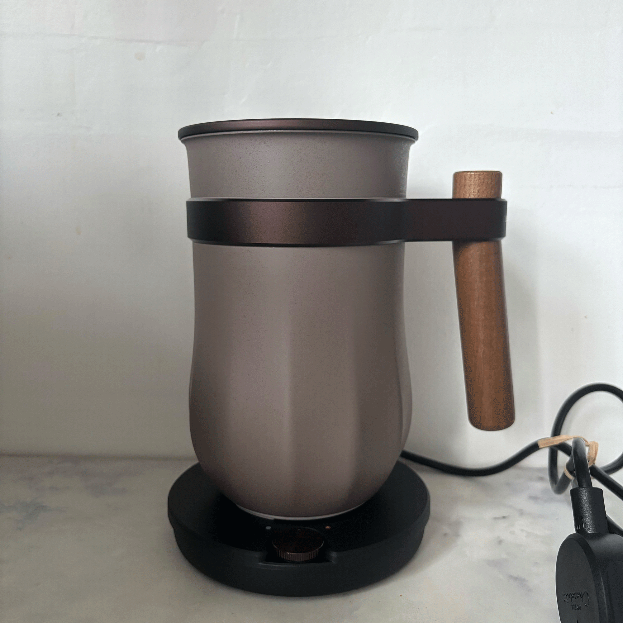 Hotel Chocolat velvetiser against white wall