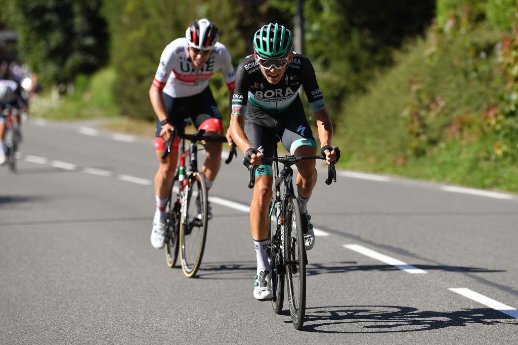 MEGEVE FRANCE AUGUST 15 Lennard Kamna of Germany and Team Bora Hansgrohe David De La Cruz of Spain and Team UAE Team Emirates during the 72nd Criterium du Dauphine 2020 Stage 4 a 1533km stage from Ugine to Megeve 1458m dauphine Dauphin on August 15 2020 in Megeve France Photo by Justin SetterfieldGetty Images