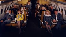 A screenshot of passengers sitting in their seats in 1970 disaster movie Airport