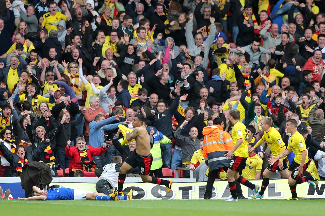 Troy Deeney removes his shirt in celebration after scoring the winning goal on aggregate for Watford against Leicester City in the 2012/13 Championship play-off semi-final