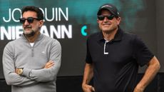 Yasir Al-Rumayyan and Scott O'Neil standing next to each other at a LIV Golf tournament