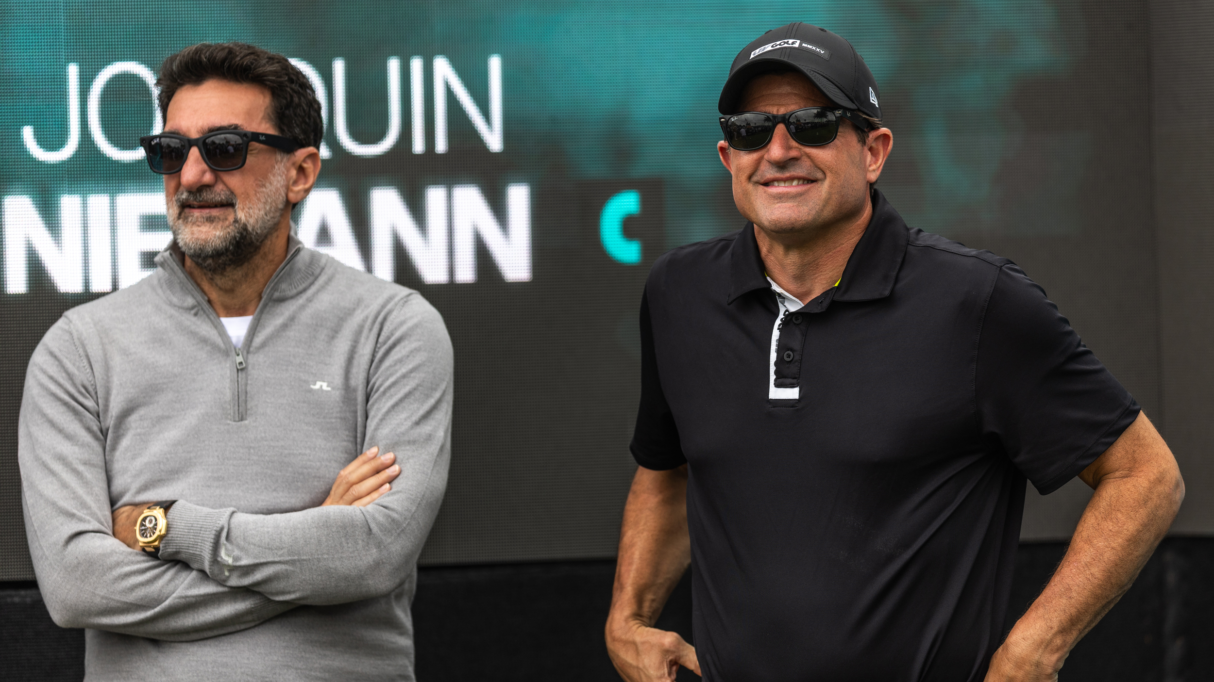 Yasir Al-Rumayyan and Scott O'Neil standing next to each other at a LIV Golf tournament