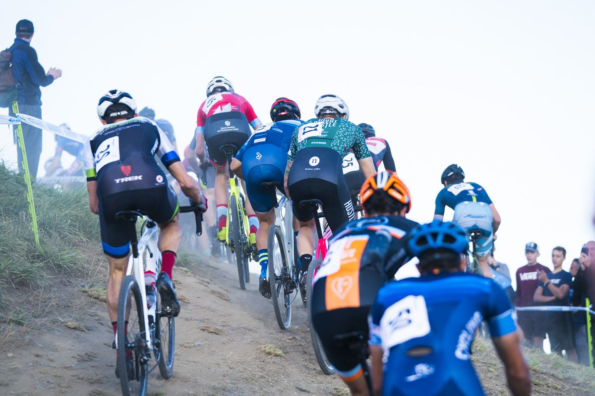 The men's field on a climb at the US Open of Cyclocross