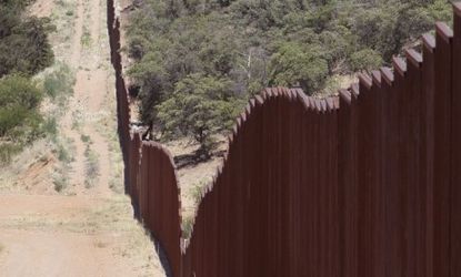 A fence separates the cities of Nogales, Arizona and Nogales, Sonora Mexico, a frequent crossing point for illegal immigrants.