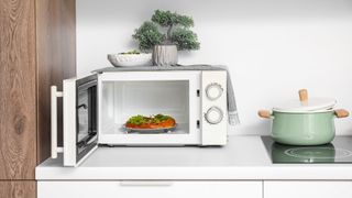 Where should a microwave go in the kitchen