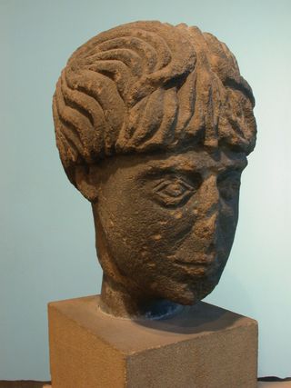 carved head of deity