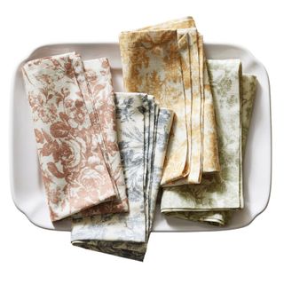 set of four floral patterned table napkins