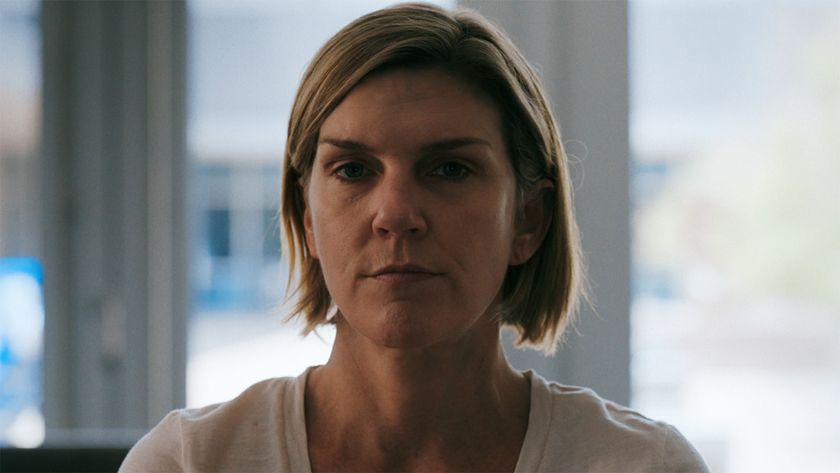 A close up of an unimpressed Carol in Pluribus episode 3