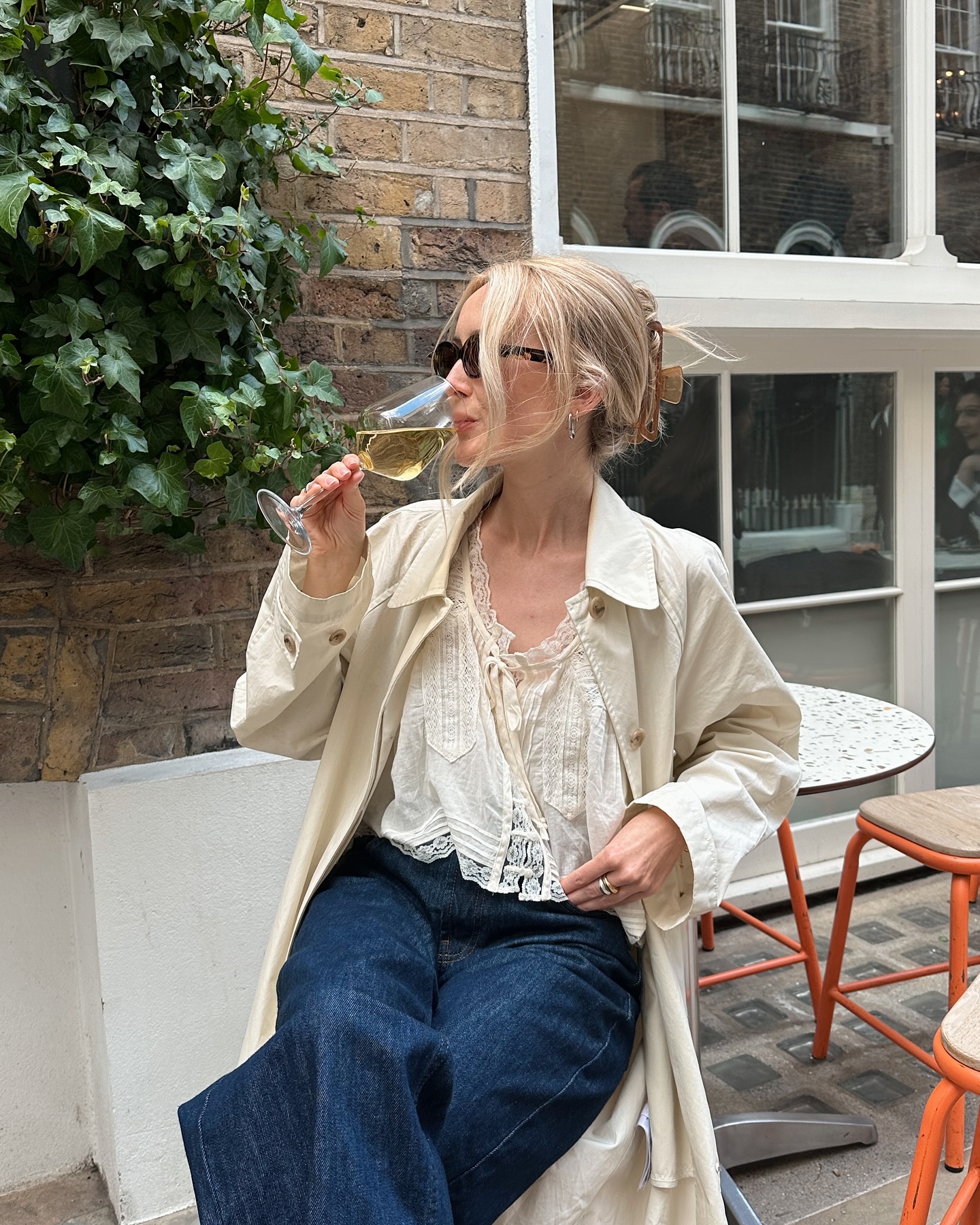 Influencer wears a romantic blouse.