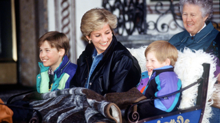 Princess Diana With Prince William And Prince Henry (harry) In Lech, Austria. They Are Sitting In A Carriage With A Blanket Covering Them. Sitting Behind Is Their Nanny Olga Powell in 1993
