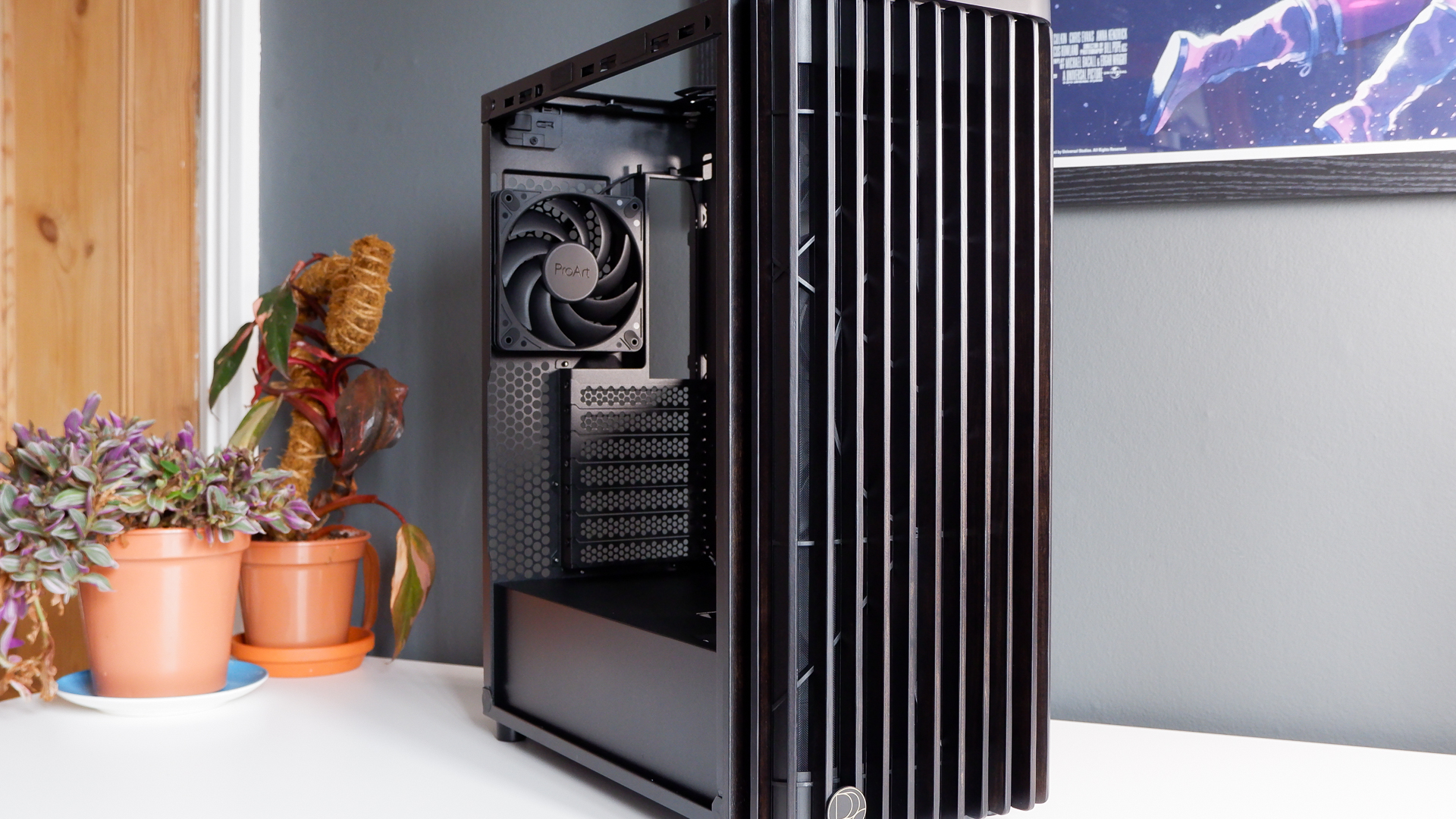 A gaming PC in the process of being built, using Radeon and Ryzen components and an Asus Pro Art PA401 PC case.