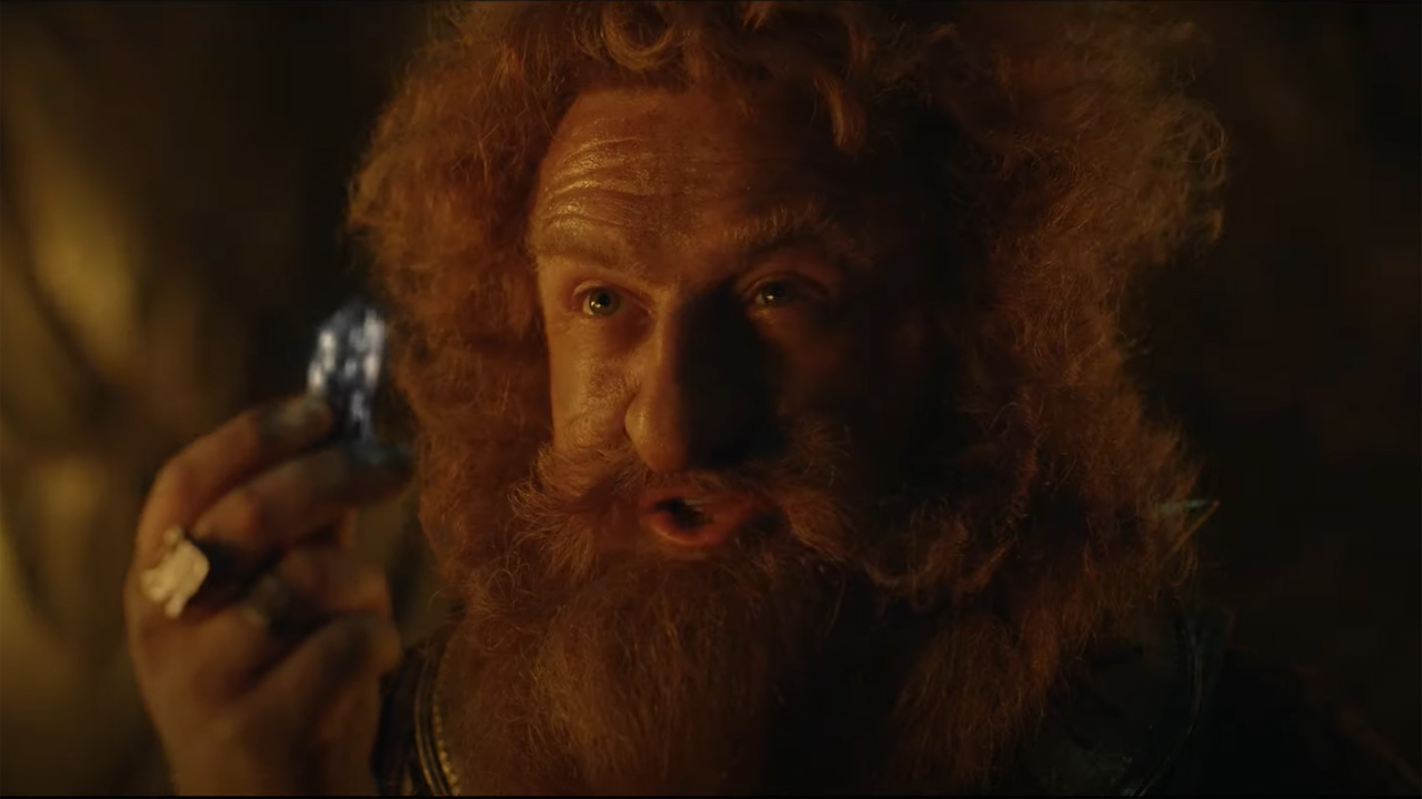 Prince Durin IV holds up a piece of Mithril in The Rings of Power's official trailer