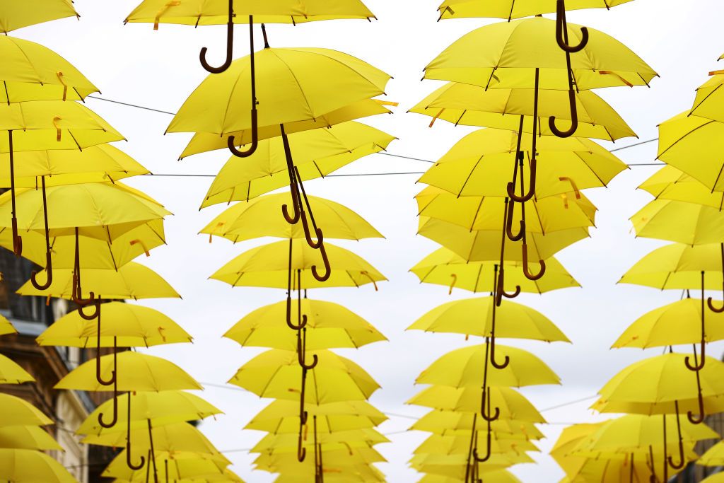 LONGWY FRANCE JULY 07 A general view of yellow umbrellas and decoration at Longwy finish village during the 109th Tour de France 2022 Stage 6 a 2199km stage from Binche to Longwy 377m TDF2022 WorldTour on July 07 2022 in Longwy France Photo by Michael SteeleGetty Images