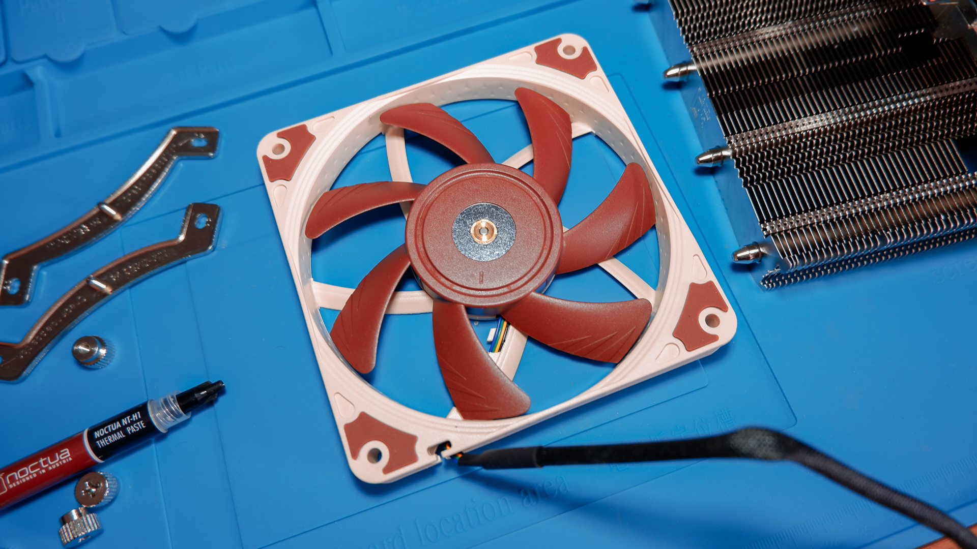 A Noctua NH-L12S cooler with mounting accessories.