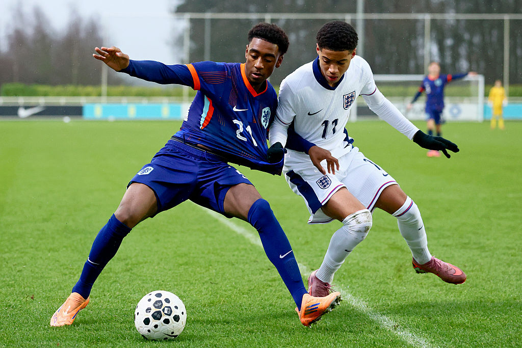 BURTON ON TREND, UNITED KINGDOM - DECEMBER 18: (L-R) Mawulom Gota Toudji of Holland U16, Emerson Nwaneri of England U16 during the U16 Men match between England U16 v Holland U16 at the ST Georges Park on December 18, 2025 in Burton On Trend United Kingdom (Photo by Paul Currie/Soccrates/Getty Images)