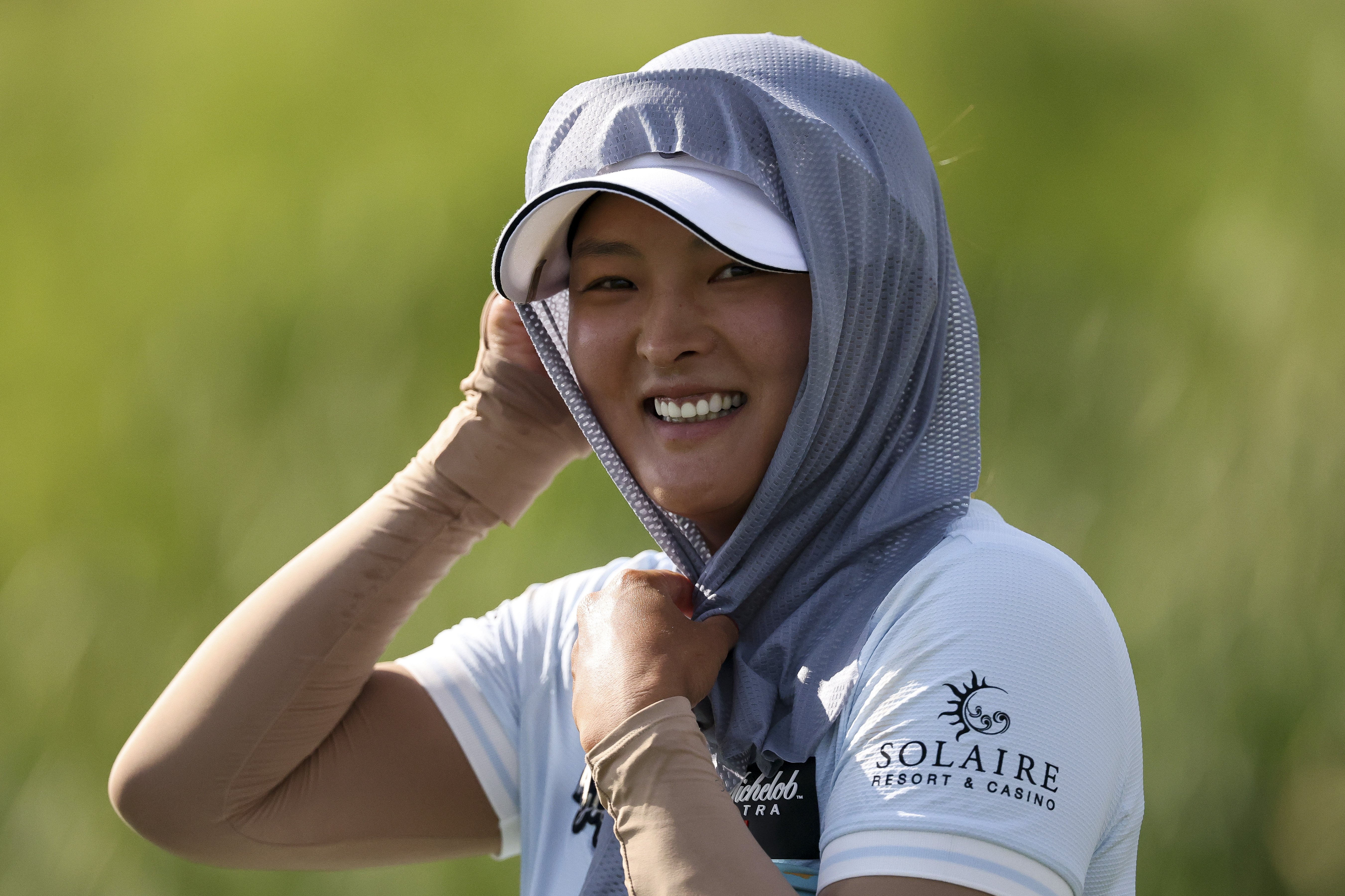 Jin Young Ko smiles to the camera