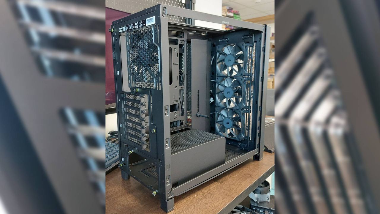 The Corsair Frame 4000X PC case seen at various stages of a PC build. This is a modular, mid-tower case with lots of options for customisation.