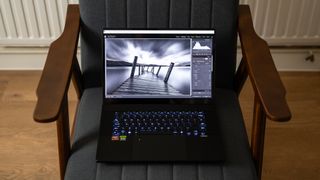 Asus ProArt P16 laptop on a chair