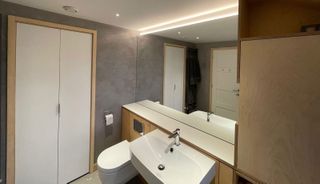 a bathroom with venetian plaster walls