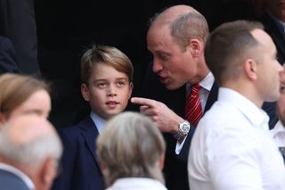 Prince George and Prince William at the rubgy