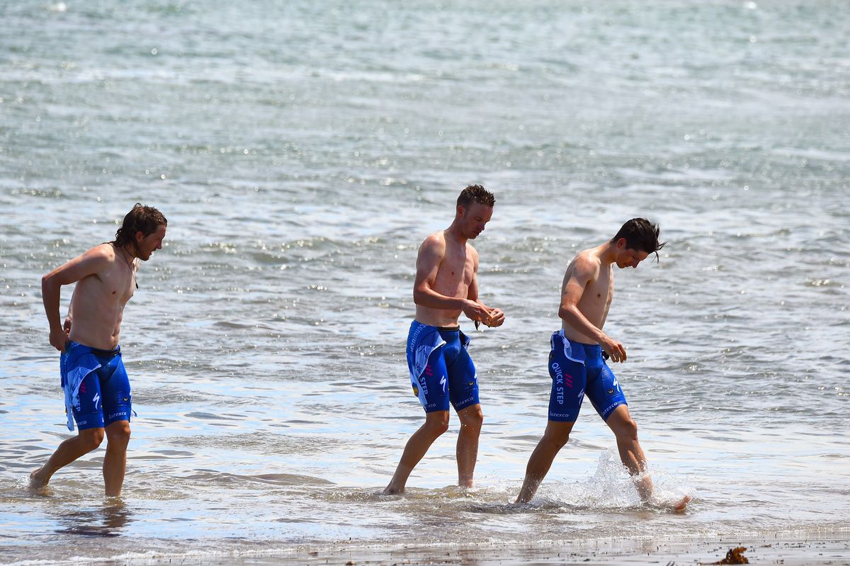 Deceuninck-QuickStep riders cool off in Victor Harbor after the stage