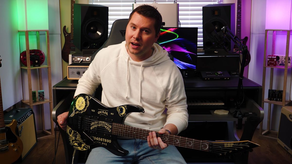 Music Is Win&#039;s Tyler Larson with Kirk Hammett&#039;s ESP Ouija Board guitar