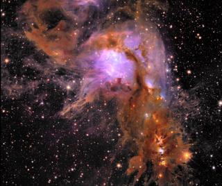 A mesmerizing scene with pink, purple, white, orange and reddish gas in a splash-pattern across the background of space, speckled with stars.