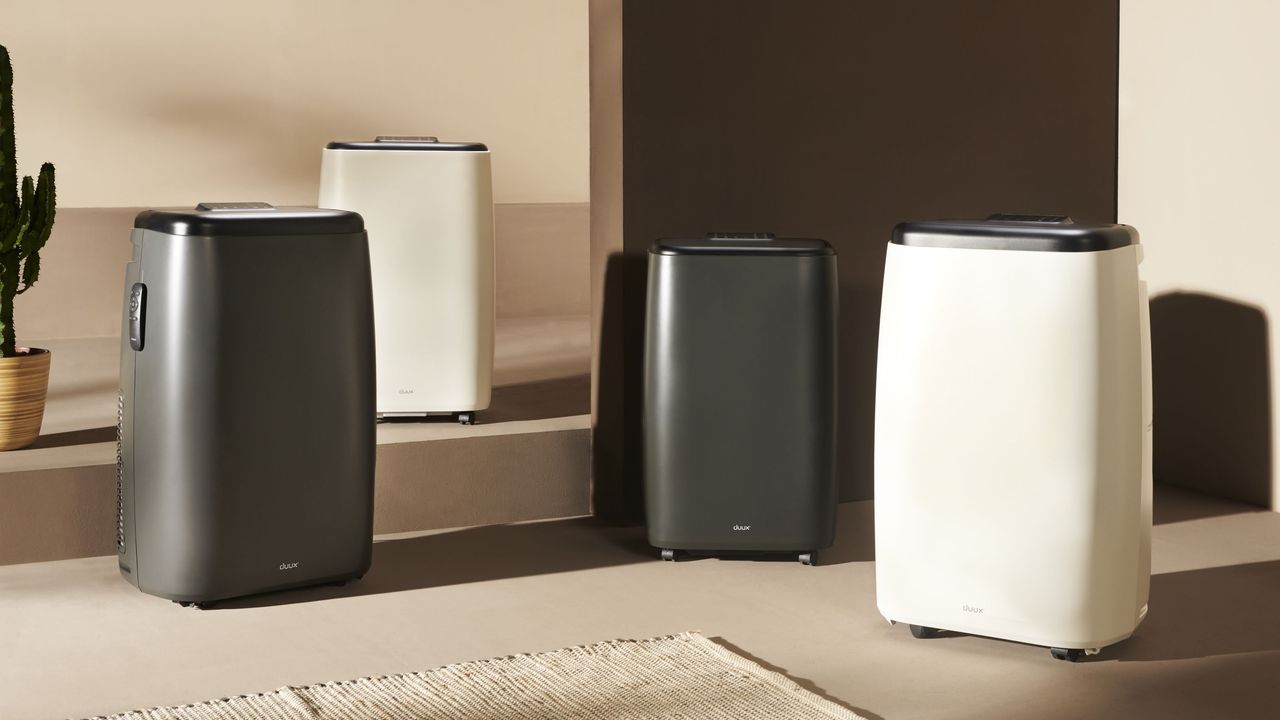 Four portable air conditioners on floor