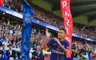 Neymar gestures to the Paris Saint-Germain fans during his official presentation as a PSG player in August 2017.