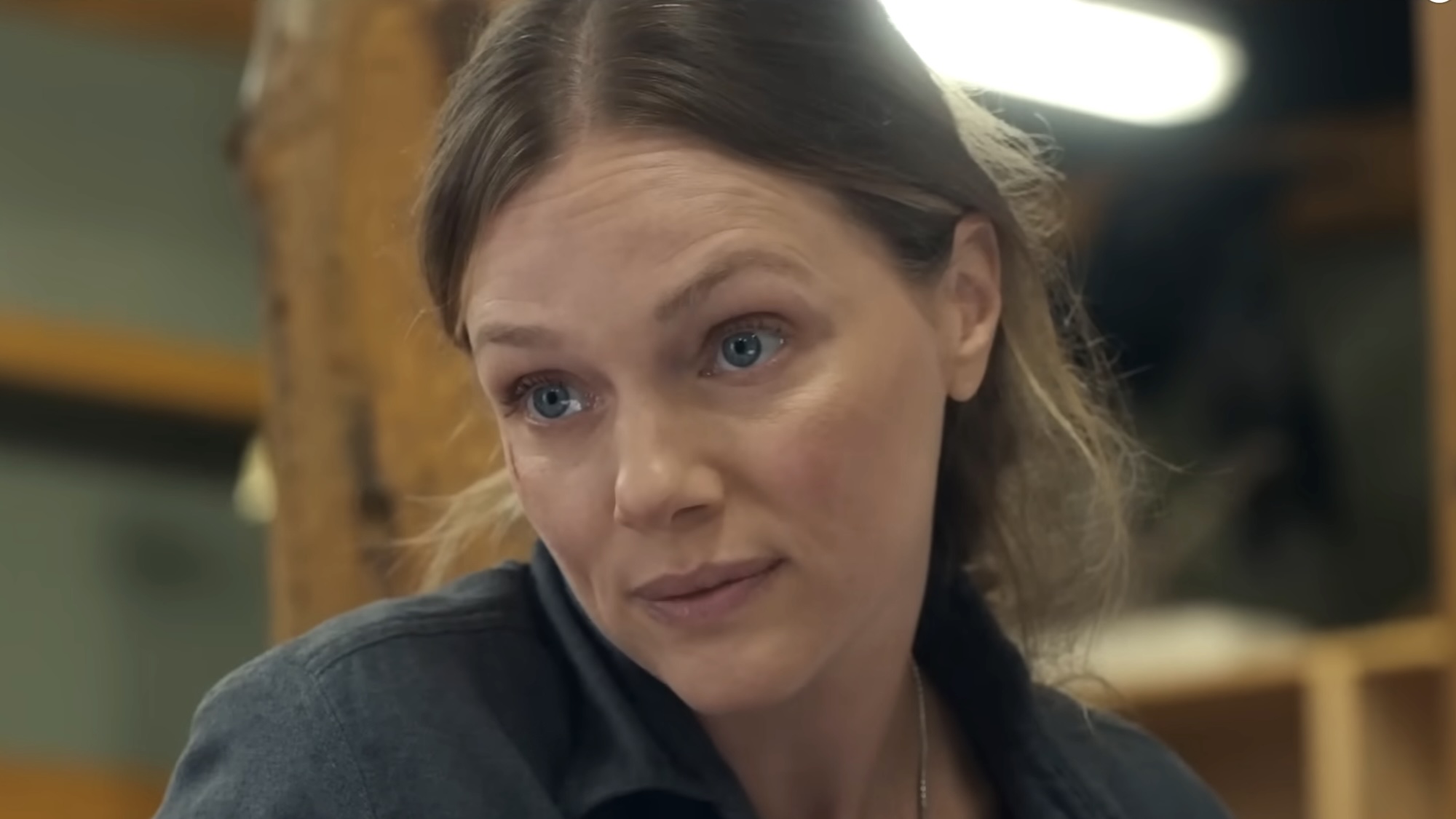 Anna looking intently at someone in Anna Pigeon