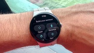 Pixel Watch 3 on a person's wrist showing the workout builder feature