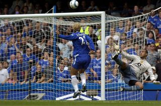 Chelsea’s Eidur Gudjohnsen beats Manchester United goalkeeper Tim Howard to score in August 2004