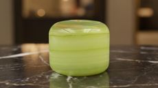 A green marble touch lamp from Amazon on a marble countertop