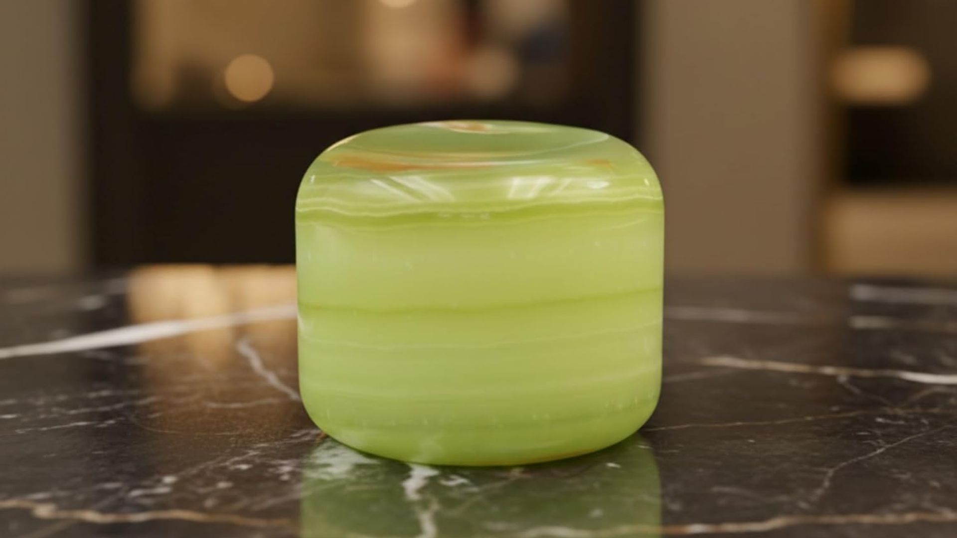 A green marble touch lamp from Amazon on a marble countertop
