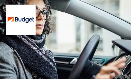Woman setting up navigation in the car