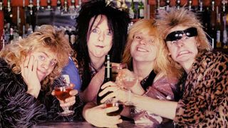 The Babysitters drinking at a bar