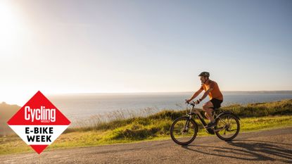 Male cyclist riding an electric bike to stay fit