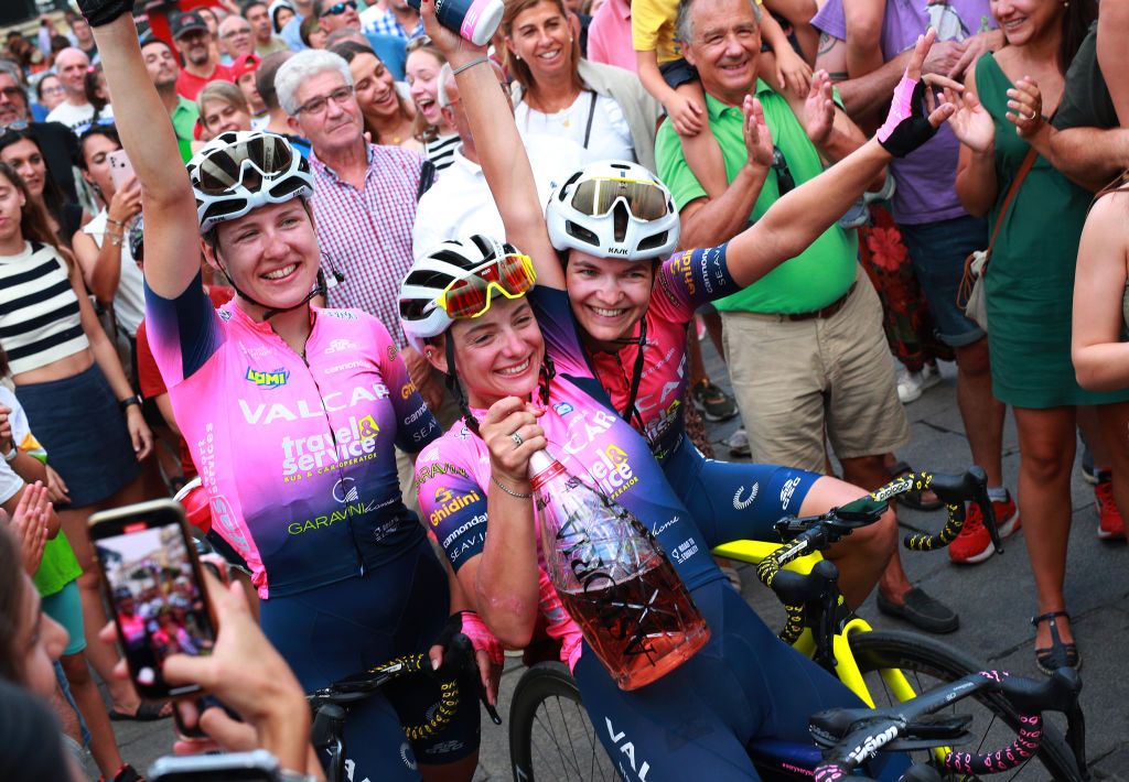 SEGOVIA SPAIN SEPTEMBER 10 Lizzie Stannard of Australia Karolina Kumiega of Poland and Olivia Baril of Canada and Team Valcar Travel Service celebrate at podium the victory of Silvia Persico of Italy and Team Valcar Travel Service during the 8th Ceratizit Challenge By La Vuelta 2022 Stage 4 a 1604km stage from Palencia to Segovia 1005m CERATIZITChallenge22 UCIWWT on on September 10 2022 in Segovia Spain Photo by Gonzalo Arroyo MorenoGetty Images