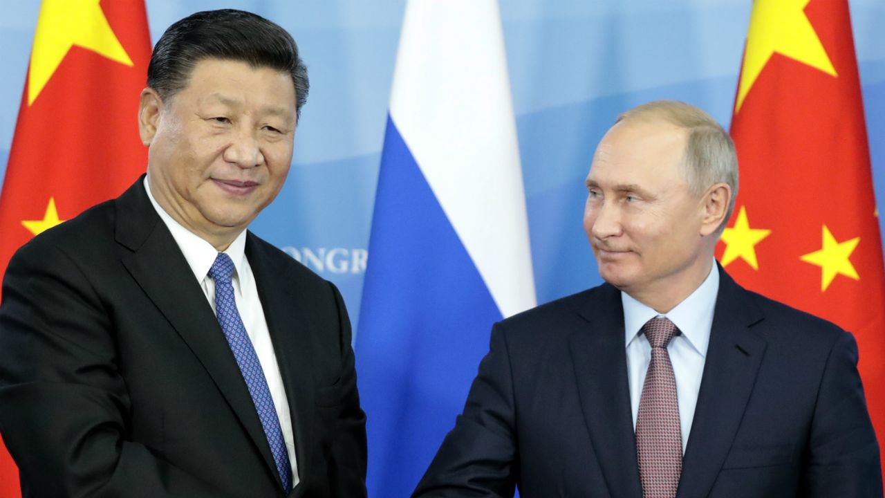 Vladimir Putin and Xi Jinping