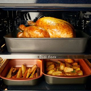 Samsung Dual Cook oven with turkey, parsnips and potatoes