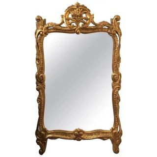 A gilded gold mirror from 1stDibs