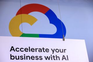 A slogan which reads "Accelerate your business with AI", at the Google booth at the Hannover Messe 2024 trade fair in Hannover, Germany, on Monday, April 22, 2024.