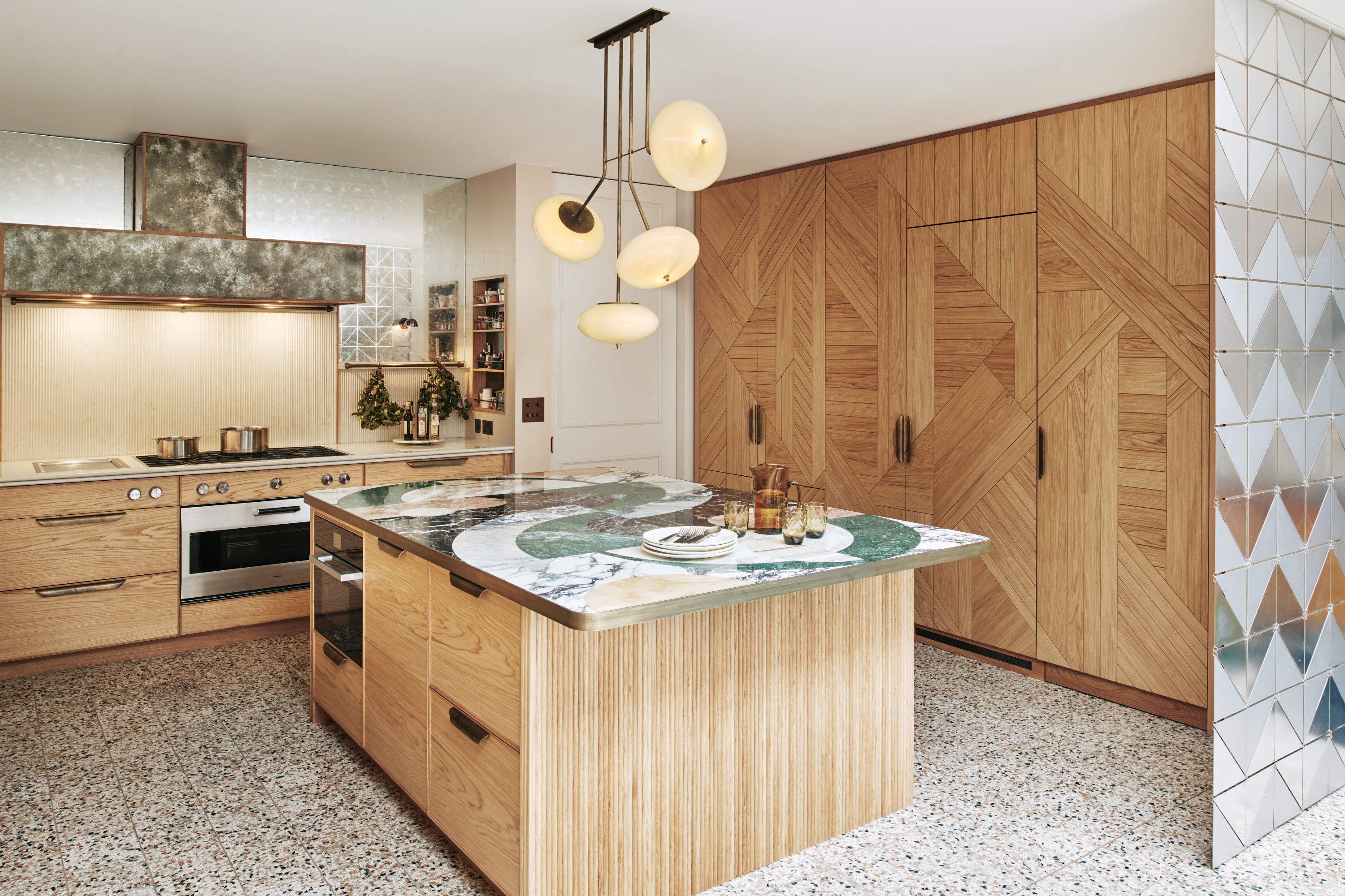 Kitchen with oak creative veneer cabinets by Ledbury Studio