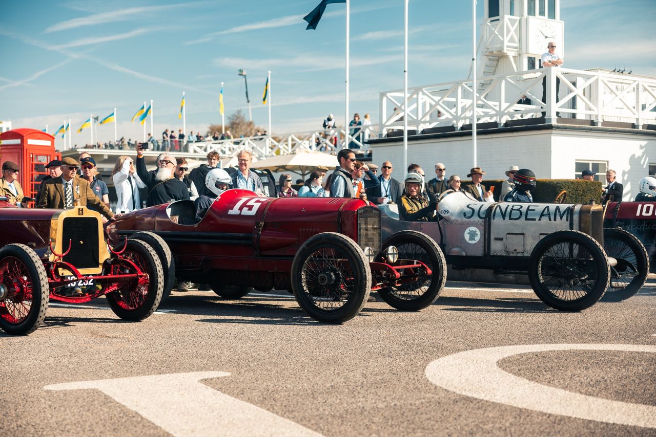 Images from the Revival. Fast cars, people in vintage dress, everyone having a nice time.