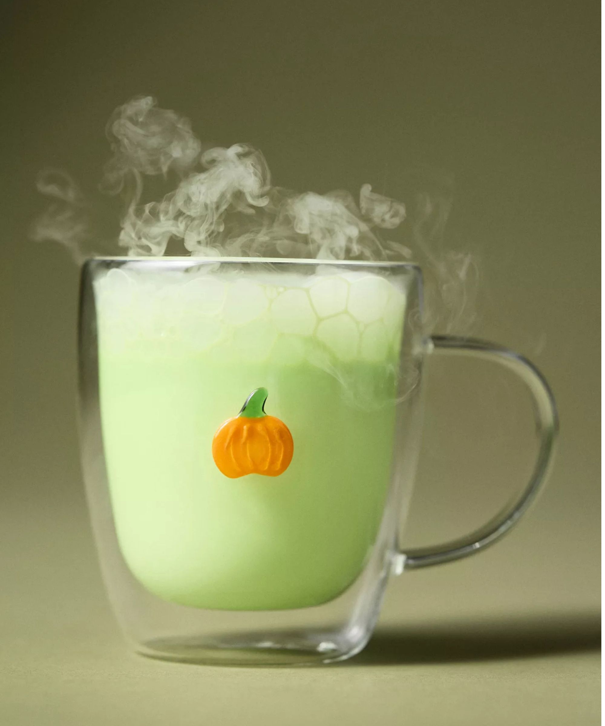 Glass mug with small pumpkin design