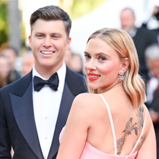  Colin Jost and Scarlett Johansson attend the "Asteroid City" red carpet during the 76th annual Cannes film festival at Palais des Festivals on May 23, 2023 in Cannes, France