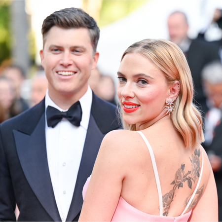  Colin Jost and Scarlett Johansson attend the "Asteroid City" red carpet during the 76th annual Cannes film festival at Palais des Festivals on May 23, 2023 in Cannes, France