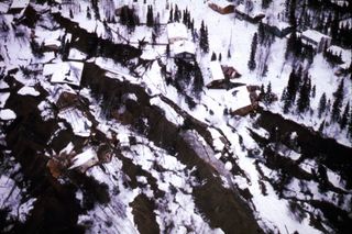 An aerial view of the Turnagain Heights landslide in Anchorage. The area is now Earthquake Park.