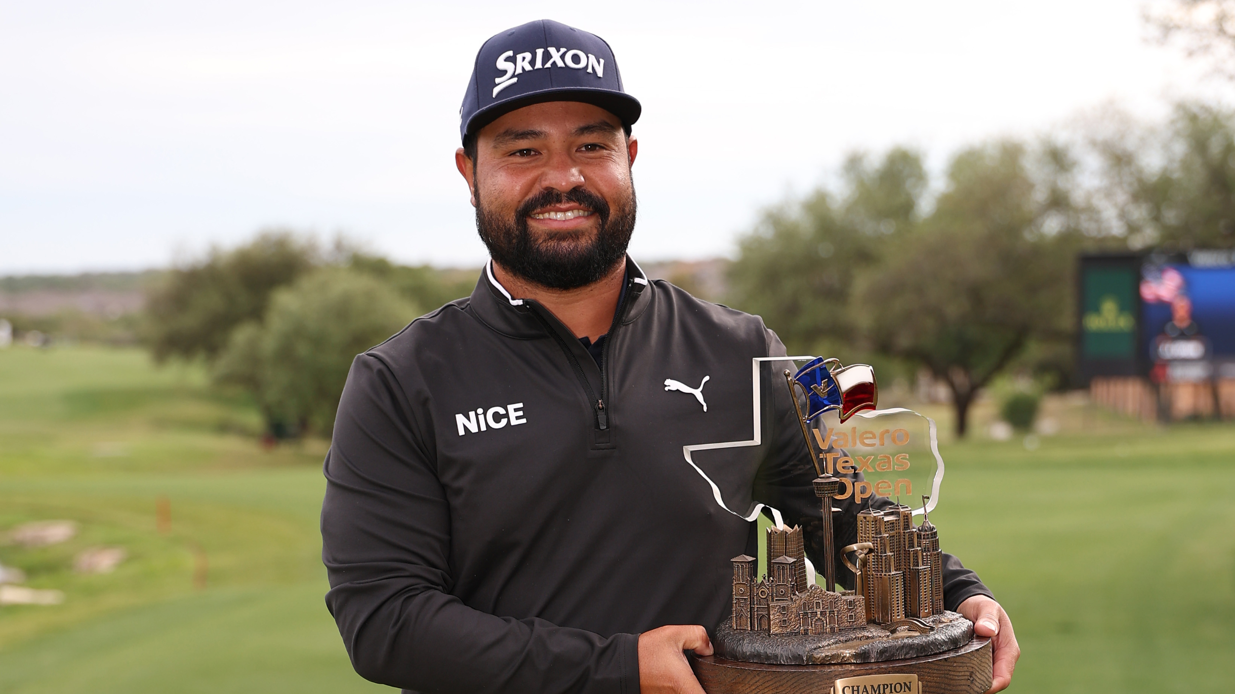 JJ Spaun with the Valero Texas Open trophy