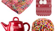 red teapot with pouffe and knit throw